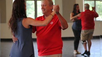 Tim Hickey dances the Argentine tango with Mimi Lamantia to build strength and balance after surviving cancer. Like many patients, Hickey suffered from peripheral neuropathy, which can occur when chemotherapy damages nerves in the legs and feet, causing balance issues.